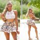 Fusta scurta in clos, neagra cu flori, cu volane suprapuse, Kamila 7 - jojofashion.ro